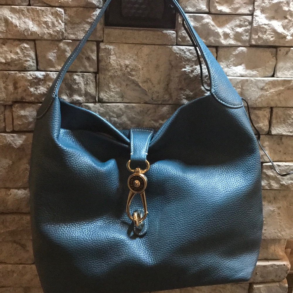 Dooney & Bourke- NWOT. Barely used !